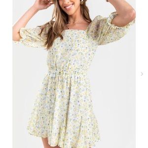 Francesca’s yellow floral dress